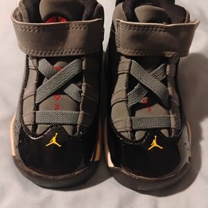 Jordan Kids Black and Gray Sneakers with Yellow Accents